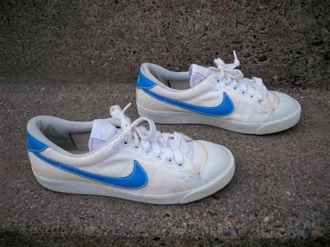 nike white with blue swoosh.